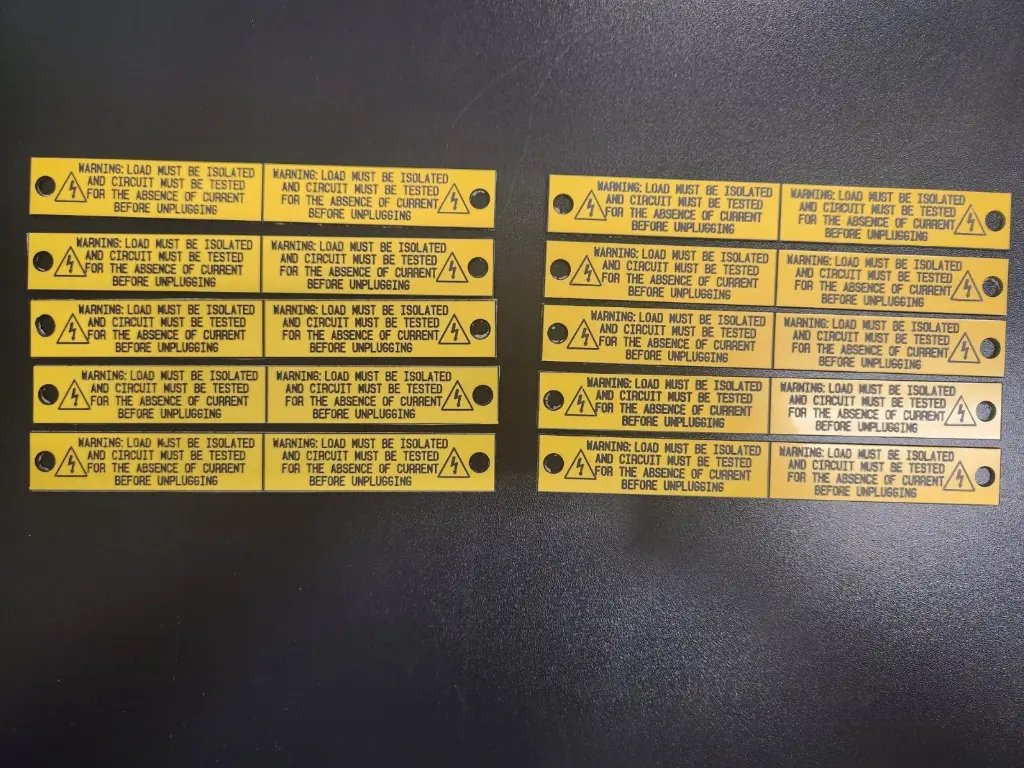 [SOLFIHWARN] “WARNING LOAD MUST BE ISOLATED” Fold in Half Labels – Pack of 10